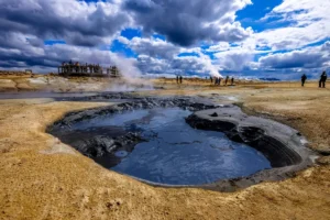 Bubbling geothermal pool and steam rising at Hveravellir in the Icelandic Highlands