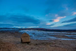 The Geysir hot spring sign is located in the geothermal area at the Golden Circle in Iceland