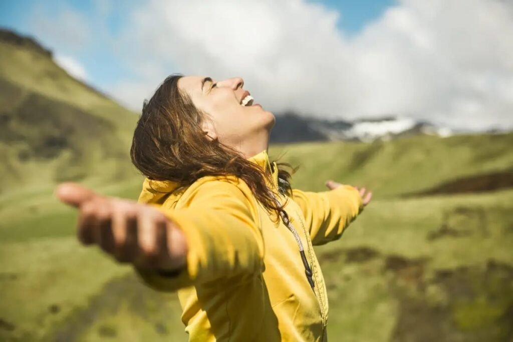 Woman enjoying nature in Iceland’s Golden Circle, promoting sustainable travel and eco-friendly tourism