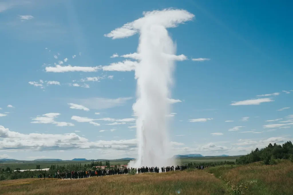 The Great Geysir is the namesake of all geysers worldwide. Though it erupts infrequently today, its geothermal field remains one of Iceland’s most important natural landmarks. This peaceful evening scene shows the Geysir marker stone, set against the steaming geothermal landscape of Haukadalur on the Golden Circle.