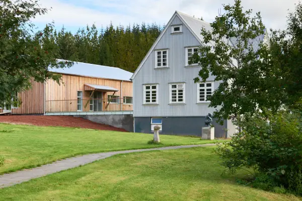 The buildings and greenery at Sólheimar Eco-Village, a sustainability-focused community in Iceland, are breathtaking