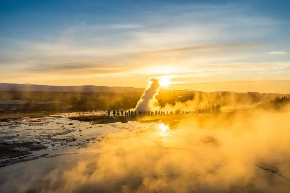 Steam rising from hot springs at Geysir geothermal area in Iceland