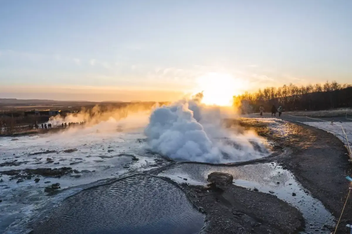 Steam rising from geothermal pools at Geysir area in Iceland