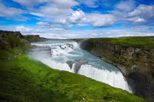 Panoramic view of Gullfoss waterfall flowing into a canyon on the Golden Circle in Iceland